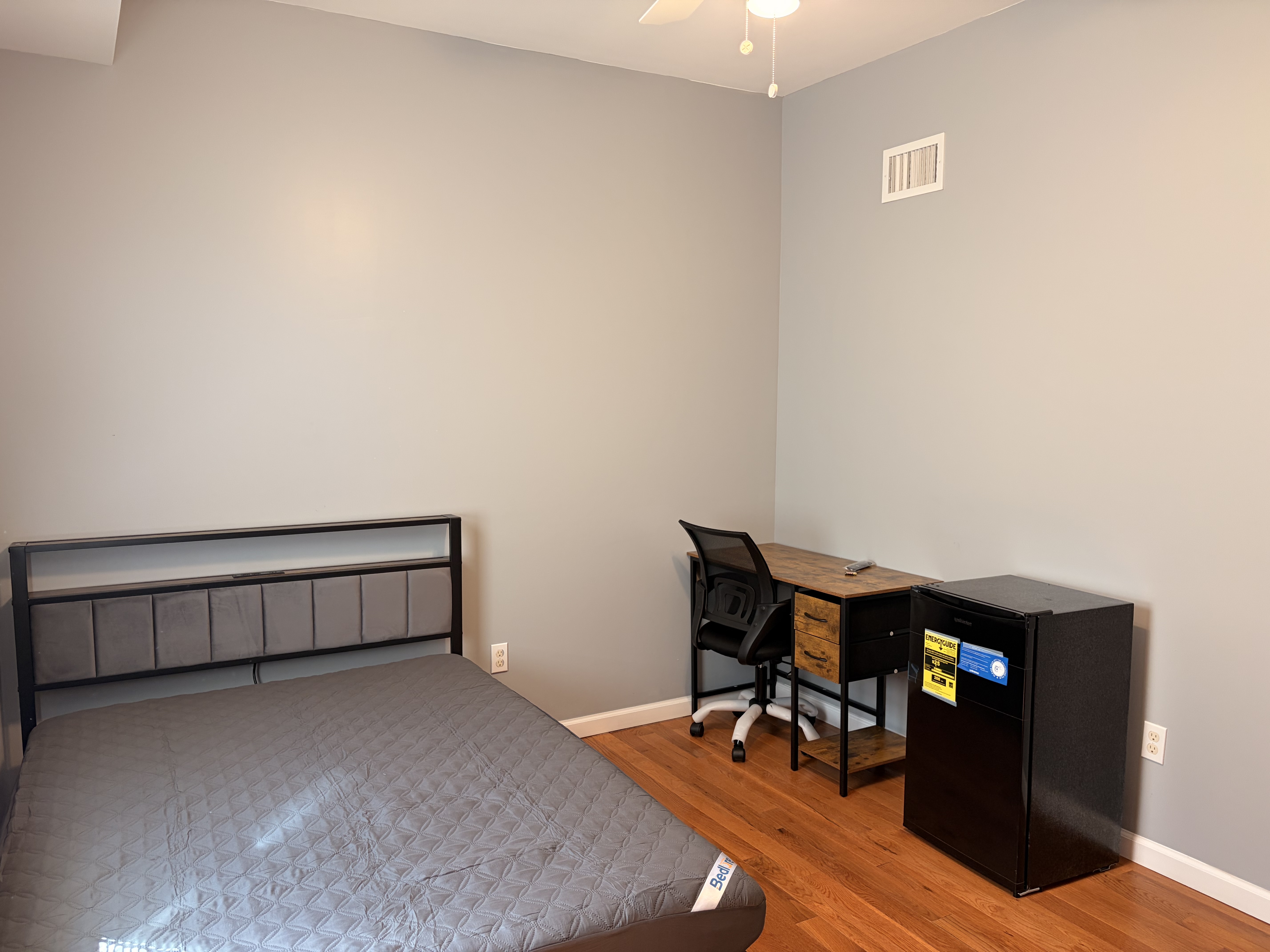 Furnished room with shared bathroom